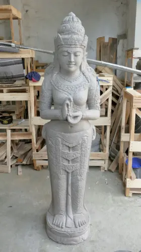 Product image of the product “Standing Dewi Sri, position greetings turning the wheel , 173 cm high riverstone grey ”
